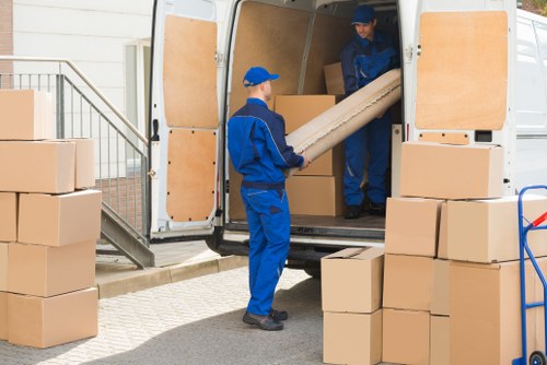 Removal van and boxes during a house move in Hammersmith