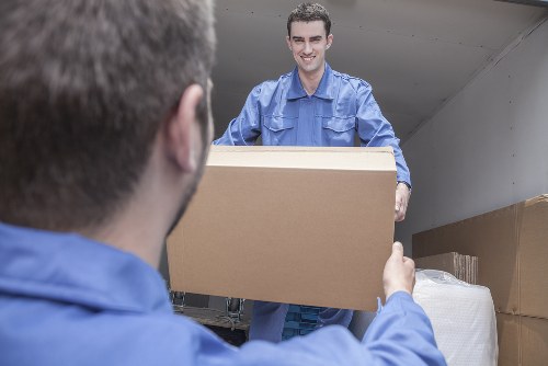 Local movers preparing fragile items in a Hammersmith flat