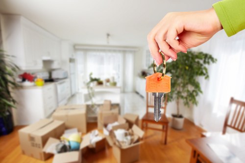 Local moving van helping with household items in West London