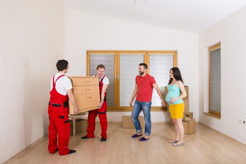 Local removals team managing access in a Hammersmith street