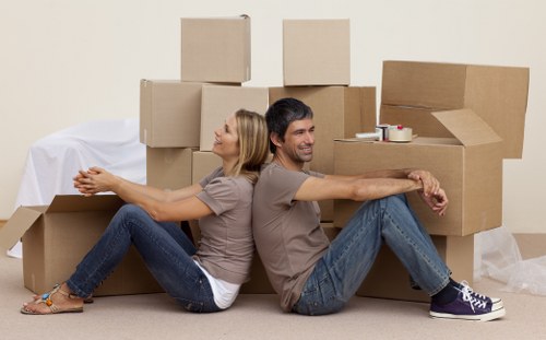 Busy West London moving day with a removal truck near Hammersmith properties