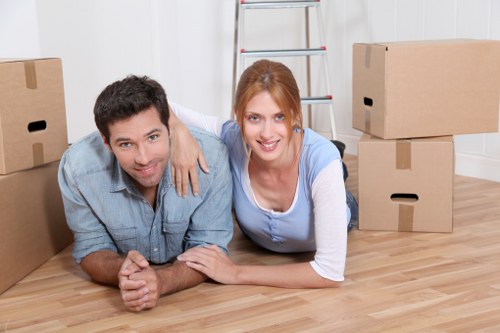 Moving crew handling stairs and apartment access in Hammersmith