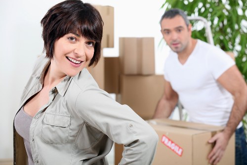 Moving service team handling items in a Hammersmith property